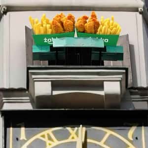 Chicken and Fries Revealed at Town Hall in a fake-out-of-home ad of Żabka