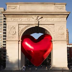 Heart Balloon Squeezing on Arch in a fake-out-of-home ad of DKNY