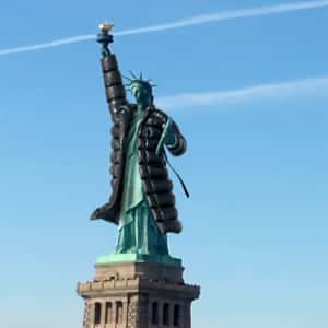 Statue of Liberty Wearing Trench Coat in a fake-out-of-home ad of DKNY