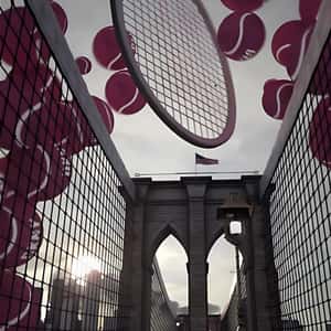 Tennis Balls and Rackets Rotates in a fake-out-of-home ad of DKNY