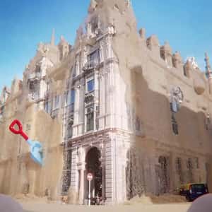 Building Turned into Sand Castle in a fake-out-of-home ad of Joie Baby