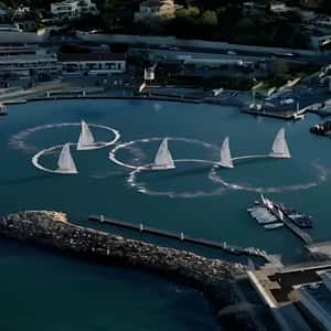 Sailboats Forming Olympic Logo in a fake-out-of-home ad of Ville de Marseille