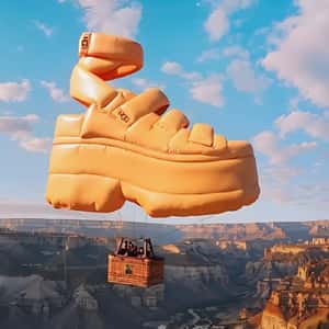 Sandal Hot Air Balloon Glides Above the Canyon in a fake-out-of-home ad of UGG
