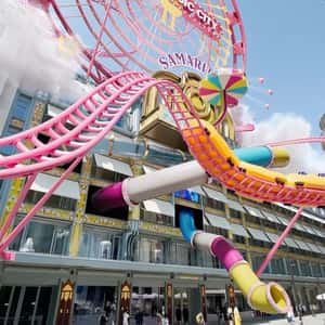 Amusement Park at Store Façade in a fake-out-of-home ad of Samaritaine Paris