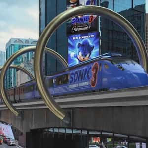 Sonic-themed Train Passing on Viaduct in a fake-out-of-home ad of Sonic Movie