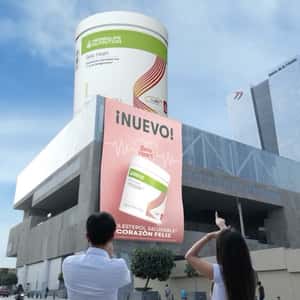 Supplement Jar Drops at Rooftop in a fake-out-of-home ad of Herbalife