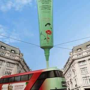 Cream Colors Double-decker Bus in a fake-out-of-home ad of Erborian