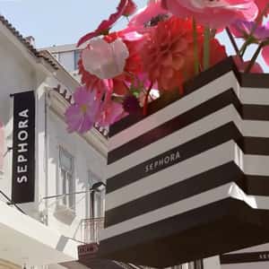 Bags Filled with Flowers on Conveyor in a fake-out-of-home ad of Sephora