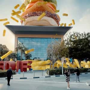 Burger Lands on Top of Mall in a fake-out-of-home ad of Roadster