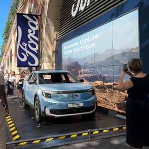 Flipping Car Display in a fake-out-of-home ad of Ford