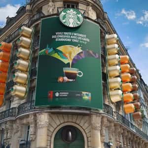 Coffee Machine Spout on Door in a fake-out-of-home ad of Starbucks