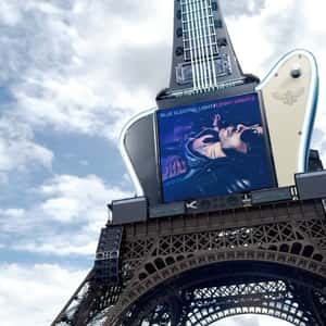 Electric Guitar on Eiffel Tower in a fake-out-of-home ad of Lenny Kravitz