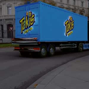 Drones Accompanying Container Truck in a fake-out-of-home ad of Takis