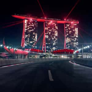 Race Track Emerges on River in a fake-out-of-home ad of Marina Bay Sands