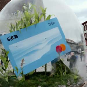 Debit Card Inside Terrarium in a fake-out-of-home ad of SEB