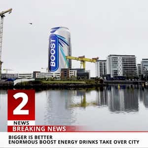 Towering Cans Spotted Around the City in a fake-out-of-home-ad of Boost Drinks
