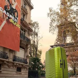 Tennis Balls Bounce Around Suitcase in a fake-out-of-home ad of Samsonite