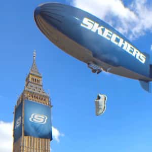 Airship Drops Shoe on Double-decker Bus in a fake-out-of-home ad of Skechers