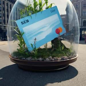 Debit Card Inside Terrarium on Street in a fake-out-of-home ad of SEB