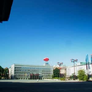 Inflatable Red Lips Between Buildings in a fake-out-of-home ad of Smile