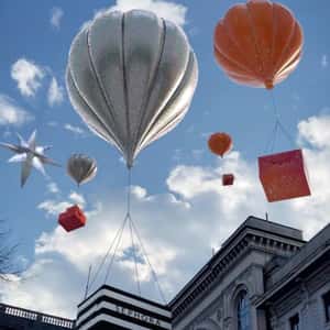 Ornament Hot Air Balloon Carries Gift Box in a fake-out-of-home ad of Sephora