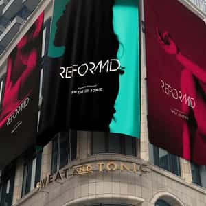 Brand Banners Waves on Fitness Center in a fake-out-of-home ad of Reformd