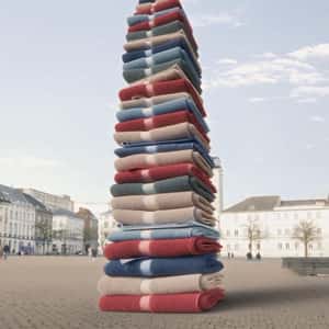 Stacked Folded Towels at the Square in a fake-out-of-home ad of HEMA