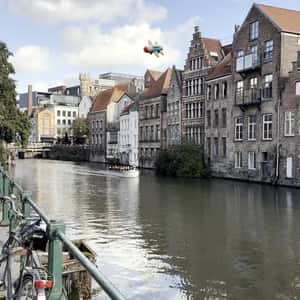 Toy Airplane Flies Over the Canal in a fake-out-of-home ad of HEMA
