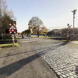 Toy Train Crossing the Railway in a fake-out-of-home ad of HEMA