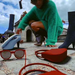 Fashion Items Rain Down in a fake-out-of-home ad of Shopbop