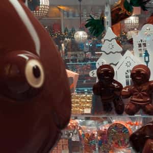 Dancing Chocolates at Store in a fake-out-of-home ad of À La Mère de Famille