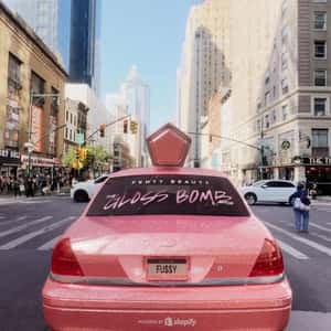 Pink Gloss Cab Roaming in NYC in a fake-out-of-home ad of Fenty Beauty