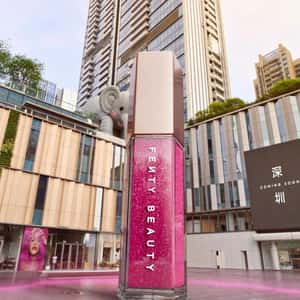 Lip Gloss Lands Like Space Rocket in a fake-out-of-home ad of Fenty Beauty
