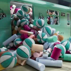 Train Loaded with Cosmetics and Balls in a fake-out-of-home ad of Fenty Beauty