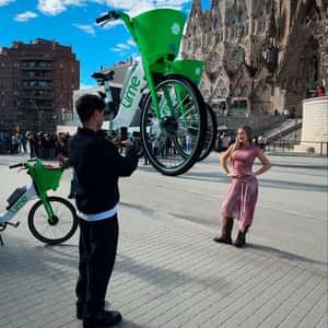 E-bike Rolls in Front of Sagrada Familia in a fake-out-of-home ad of Lime