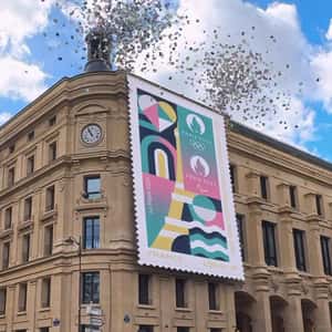 Stamp Rolls Down on Postal Office in a fake-out-of-home ad of La Poste
