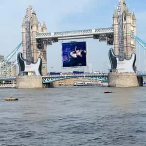 Electric Guitars on Tower Bridge in a fake-out-of-home ad of Lenny Kravitz