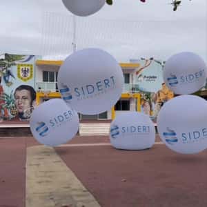 Brand Spheres Bouncing on the Street in a fake-out-of-home ad of SIDERT