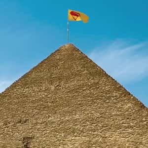 Logo Banner Waves Above Pyramid in a fake-out-of-home ad of Superman