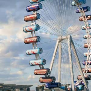 Coffee in Cans as Ferris Wheel Carts in a fake-out-of-home ad of Nestlé