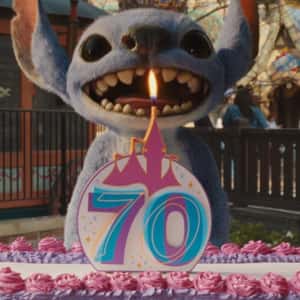 Stitch Enjoying Resort Rides in a fake-out-of-home ad of Disneyland