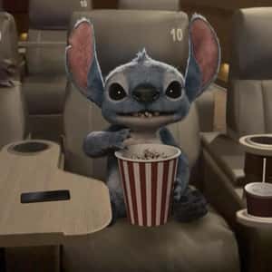 Stitch Watching Movie in Theater in a fake-out-of-home ad of Disney Studios