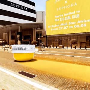 Moving Cream Leaves Yellow Trail in a fake-out-of-home ad of Sephora