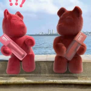 Teddy Bears Holding Lip Tint in a fake-out-of-hand of Maybelline