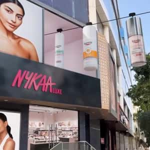 Facial Products Glide on Cable Line in a fake-out-of-home ad of Nykaa