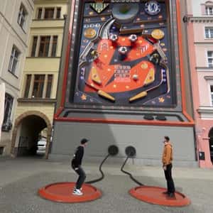 Pinball Game on Building Wall in a fake-out-of-home ad of Betano