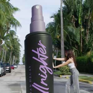 Bottle Spray Stuck on Street in a fake-out-of-home ad of Urban Decay