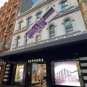 Lip Gloss Transforms Façade in a fake-out-of-home ad of Sephora