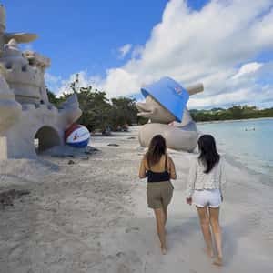 Rubber Ducky Sand Sculpture in a fake-out-of-home ad of Carnival Cruise