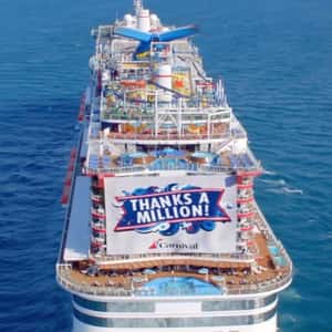 Banner Unfurls on Cruise Ship in a fake-out-of-home ad of Carnival Cruise